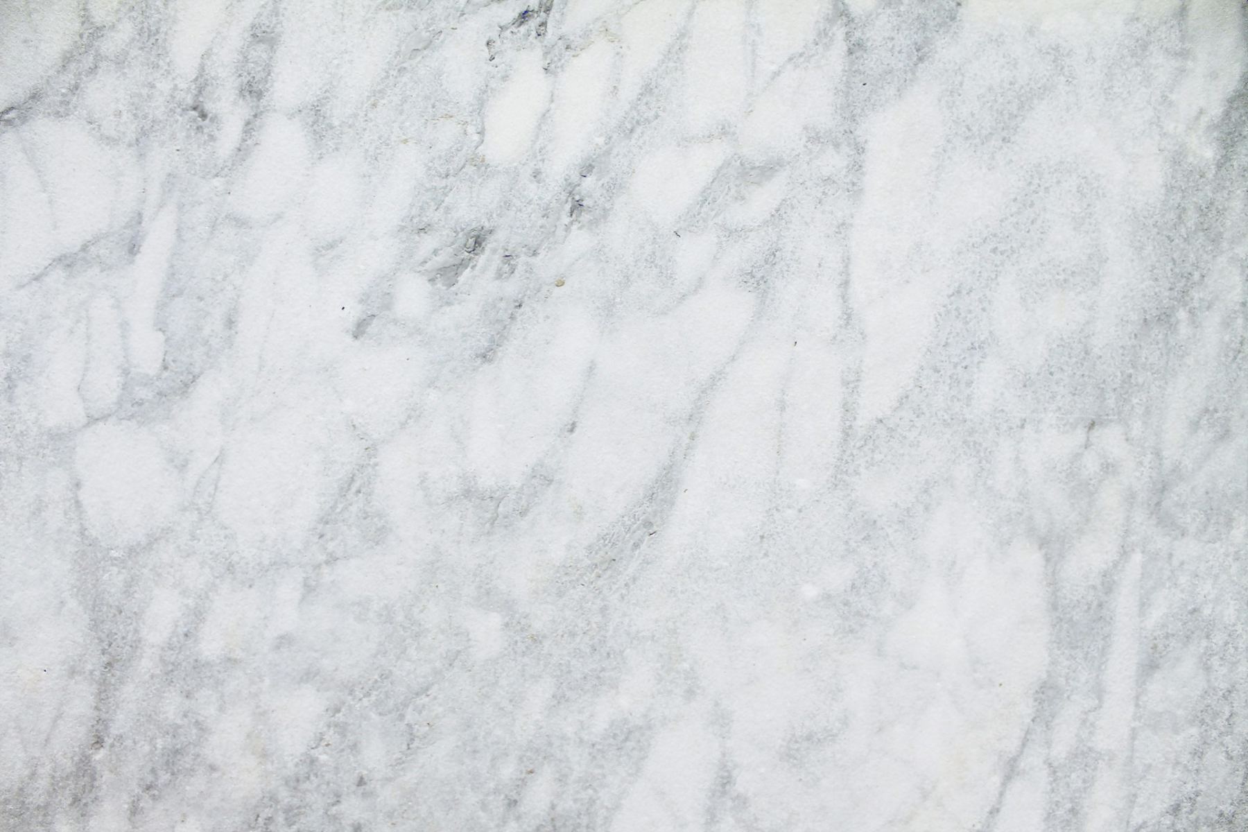 White marble surface with soft grey veining